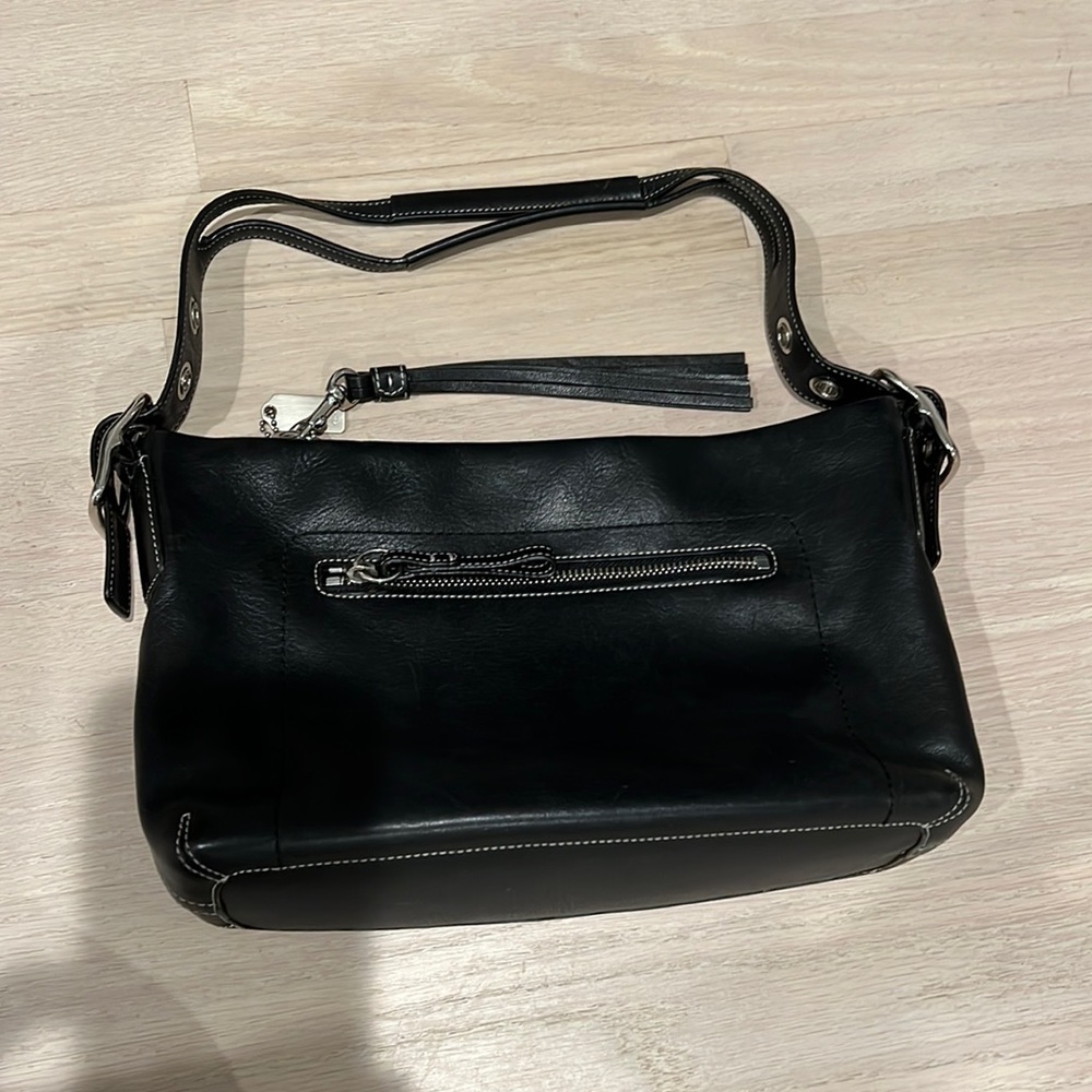 Black leather coach shoulder bag with silver hardware